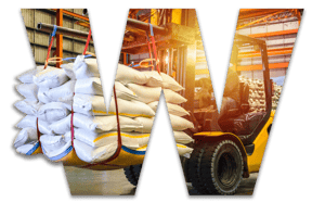 Warehouse associate moving inventory using a forklift