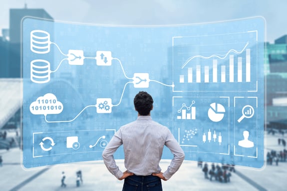 Man Reviewing Predictive Analytics Dashboard - Smart Warehousing
